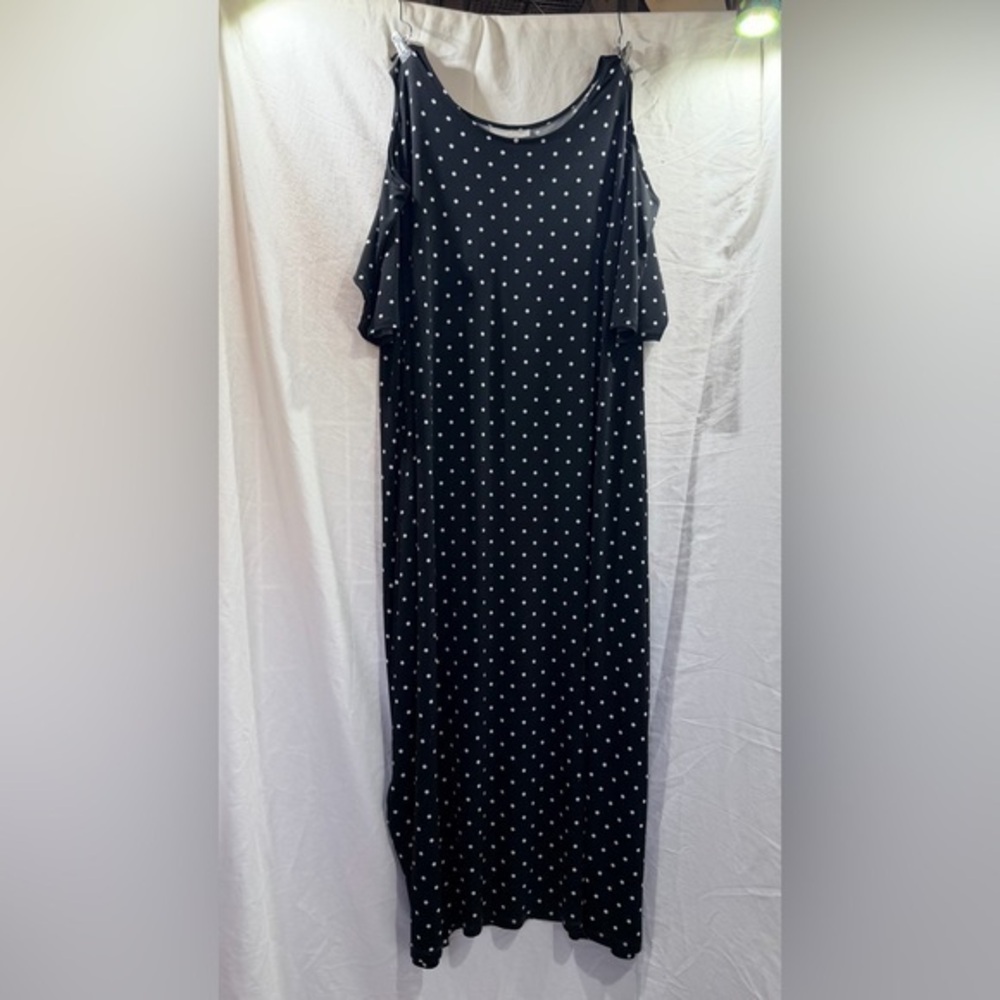 Woman Within Black Maxi Dress with White Polka Dots